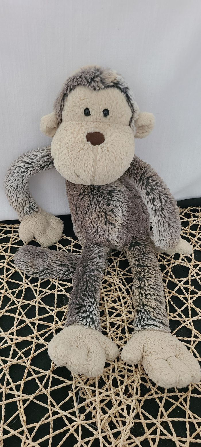 Doudou Singe marron gris chiné et beige JELLYCAT