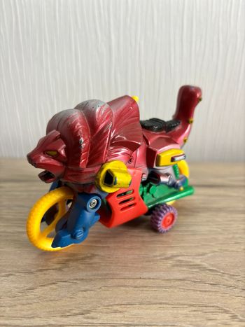Figurine jouet vintage bootleg moto lion lanceur monstre créature bazar