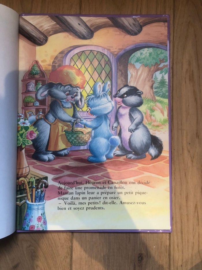 Le petit lapin bleu au se pues des poissons - photo numéro 3
