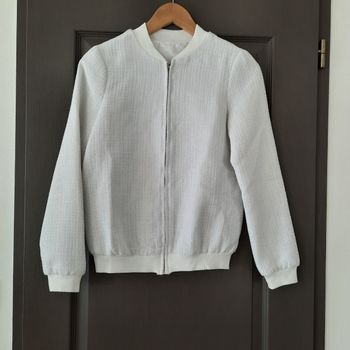 Bombers blanc avec fil argenté