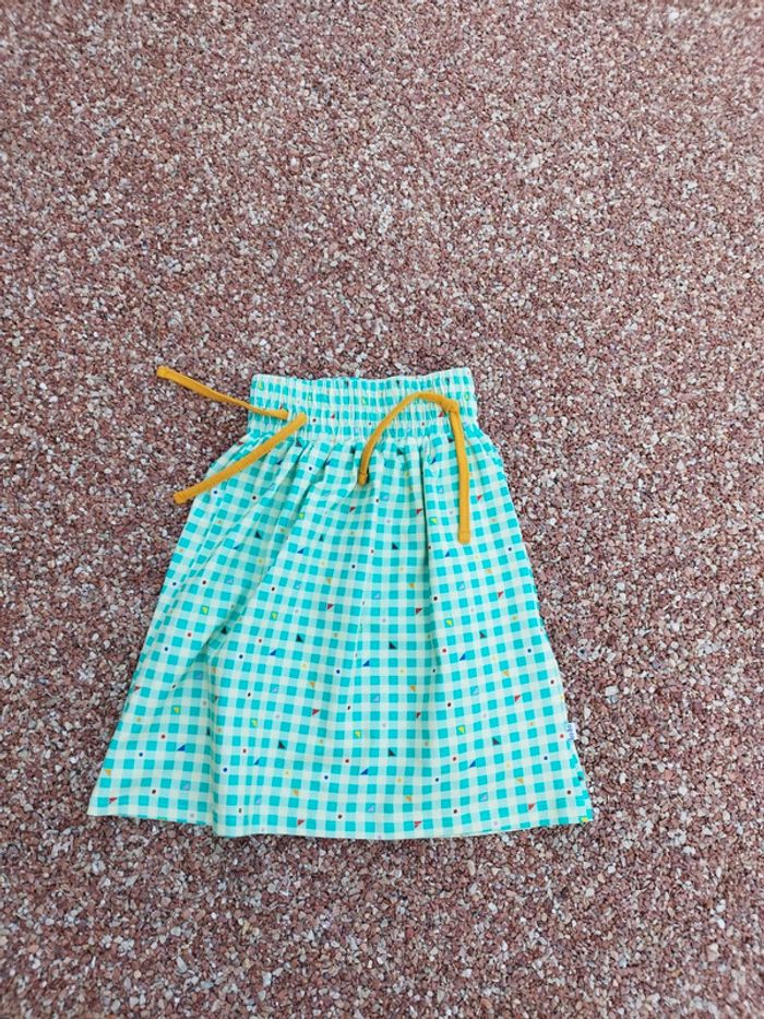 Jupe a carreaux neuve taille 104