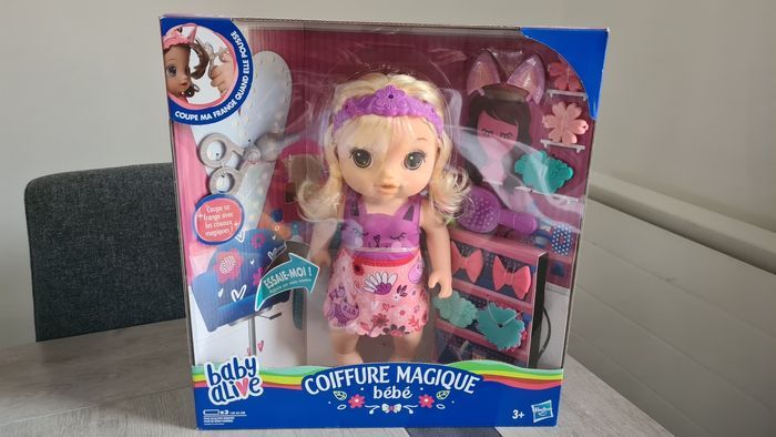 Poupon BABY ALIVE Coiffure Magique.