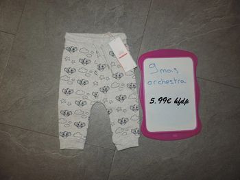 pantalon roi lion orchestra taille 9 mois neuf