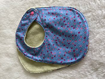 Bavoir aventurine fleur