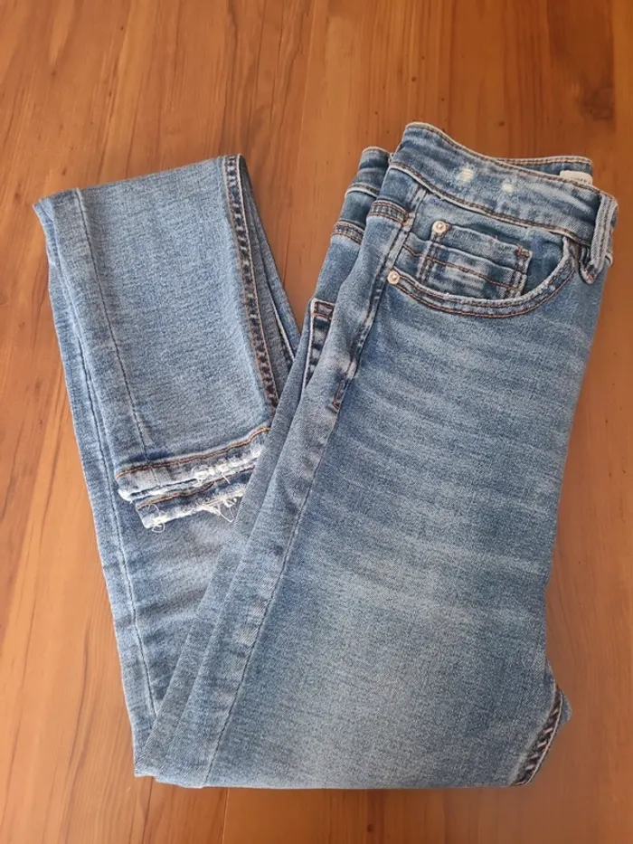 Jean slim à trous très taille haute femme