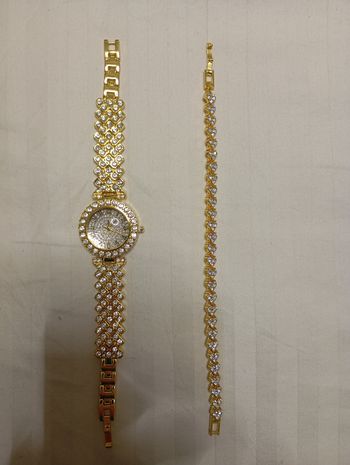 Montre et bracelet femme neuve en acier