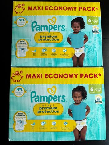 140 couches pampers premuim taille 6