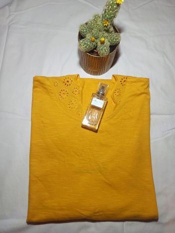 T-shirt femme jaune motard en excellente état