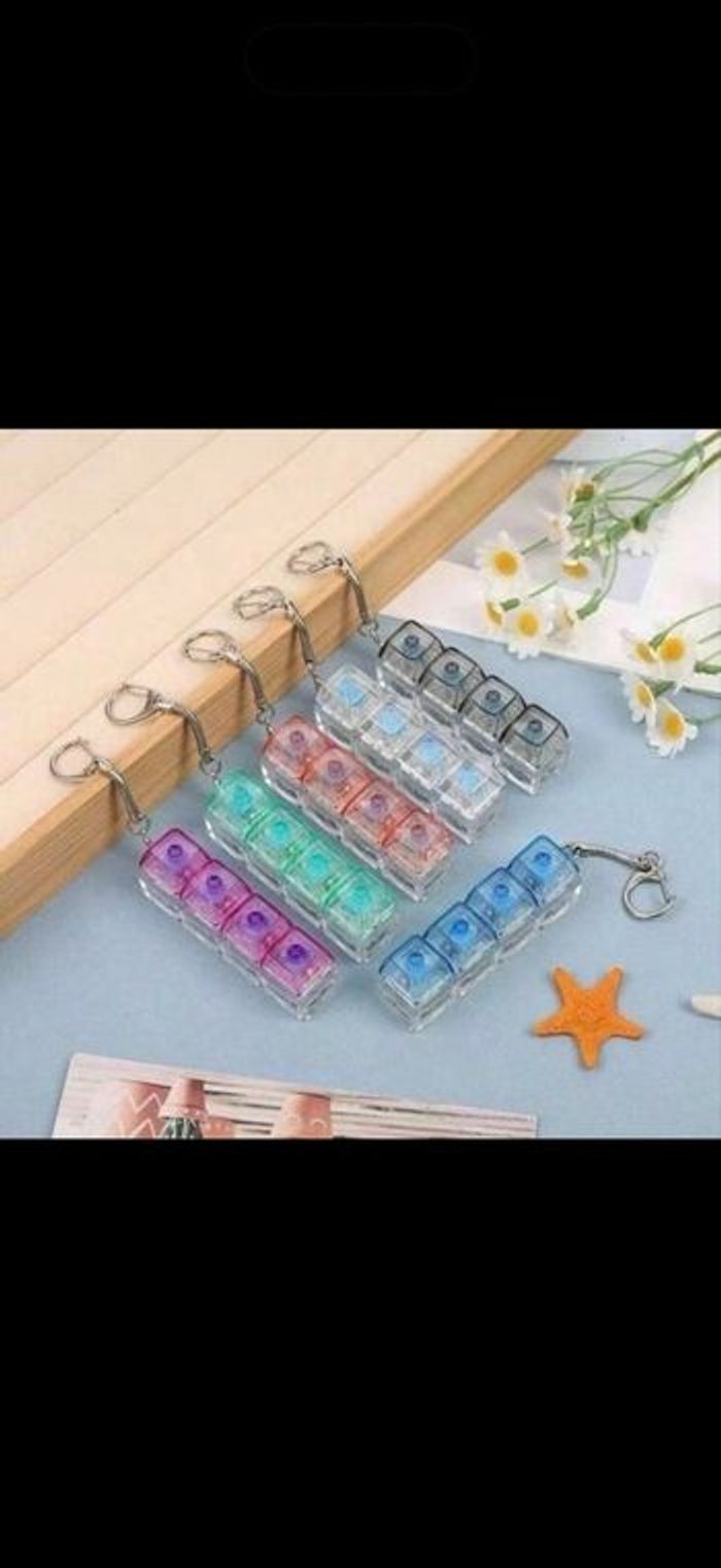 Porte clé anti stress lumineux