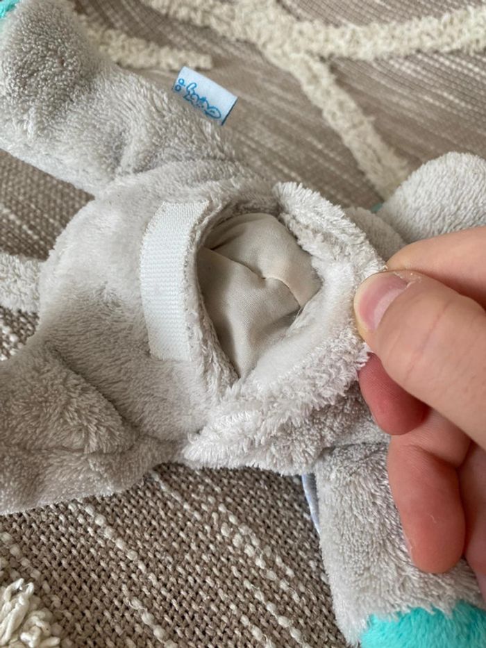 Peluche doudou bouillotte 27cm Dodie éléphant allongé gris et bleu très bon état - photo numéro 4