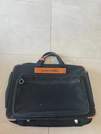 Bagage Lancel, bon état général mais il y a des petites traces d'usures, 53x35x15cm