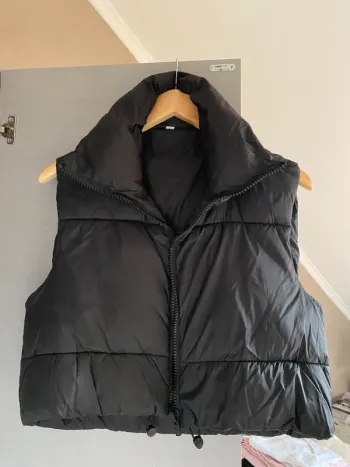 Veste sans manches courtes noire taille S