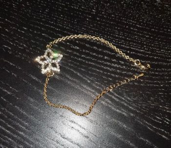 Bracelet fantaisie maille dorée avec fleur