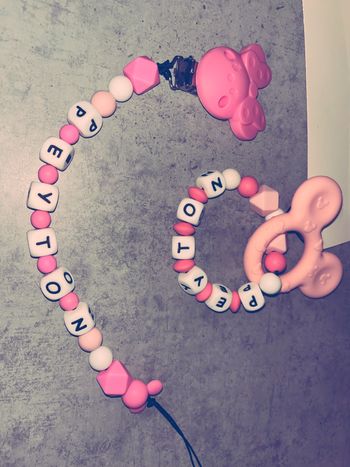 Attache tétine , anneau de dentition