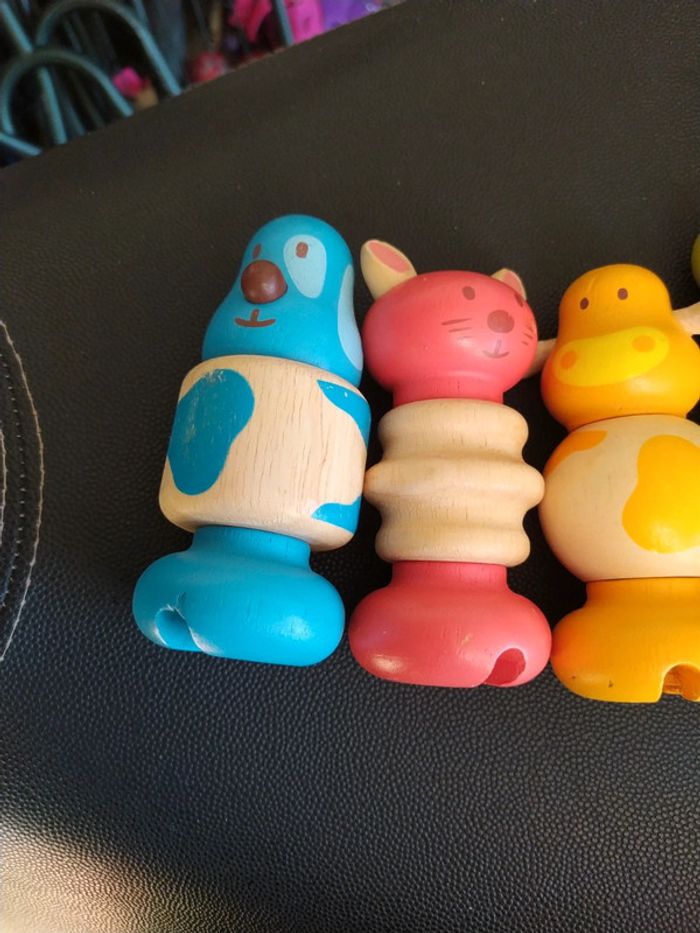 4 bonhommes en bois - photo numéro 2