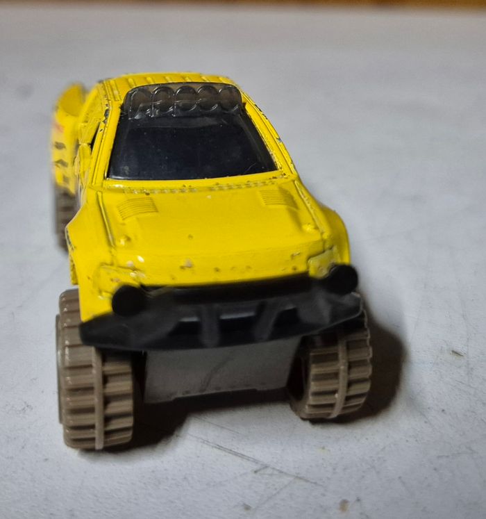 Miniature hotwheels sandblaster mud studs trucks jaune 1/64 Ford raptor  BFD61 - photo numéro 2