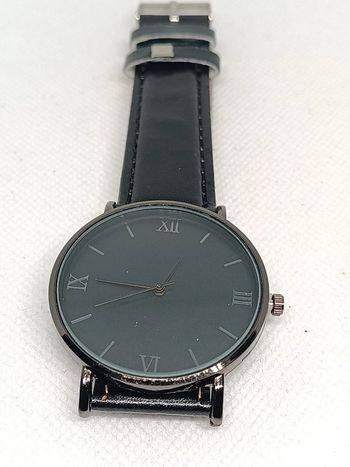 Montre homme élégante noir chiffre romain