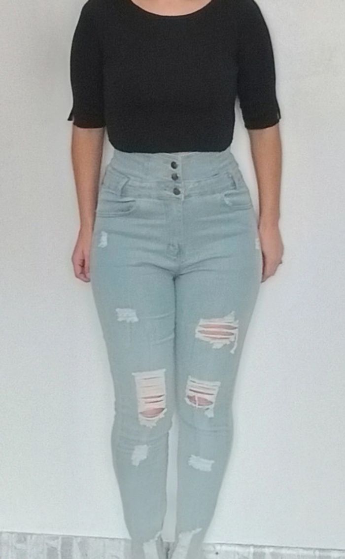 Jean slim troué délavé taille très haute 38