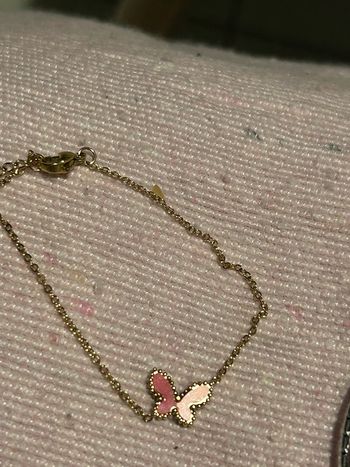 Bracelet acier doré papillon neuf