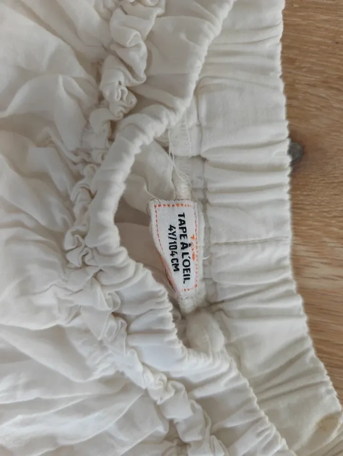 Jolie jupe blanche à volant tape à l'oeil - photo numéro 3