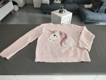 Pull rose taille 12 ans