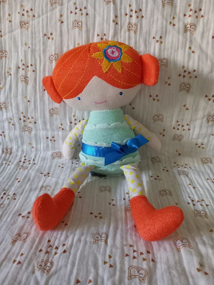 Doudou poupée Orchestra