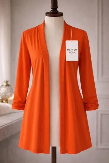 Cardigan orange avec étiquette Meryem Acar