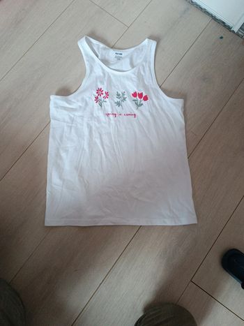 Débardeur neuf blanc motif fleur 12 ans