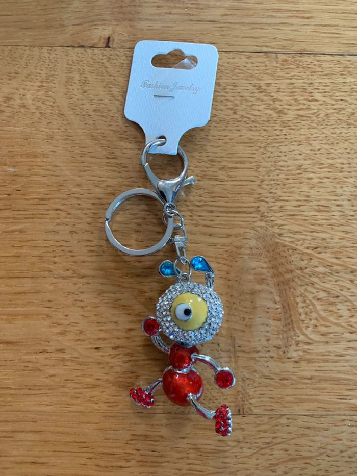 🧿 Porte-clés original personnage œil unique 💎