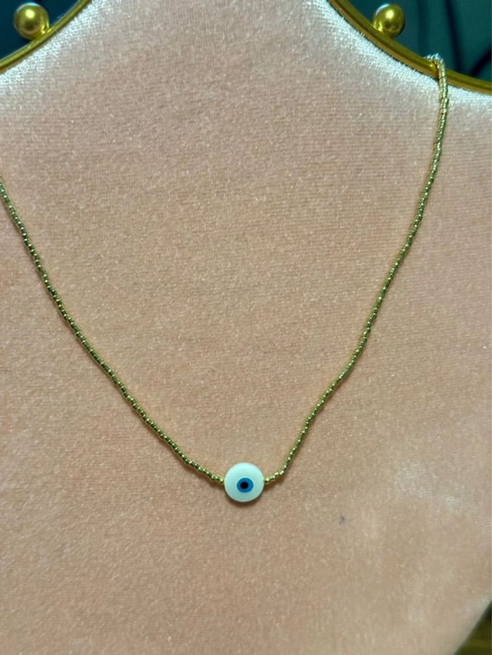 Collier réglable perles dorées œil bleu finition s acier inoxydable or - photo numéro 5