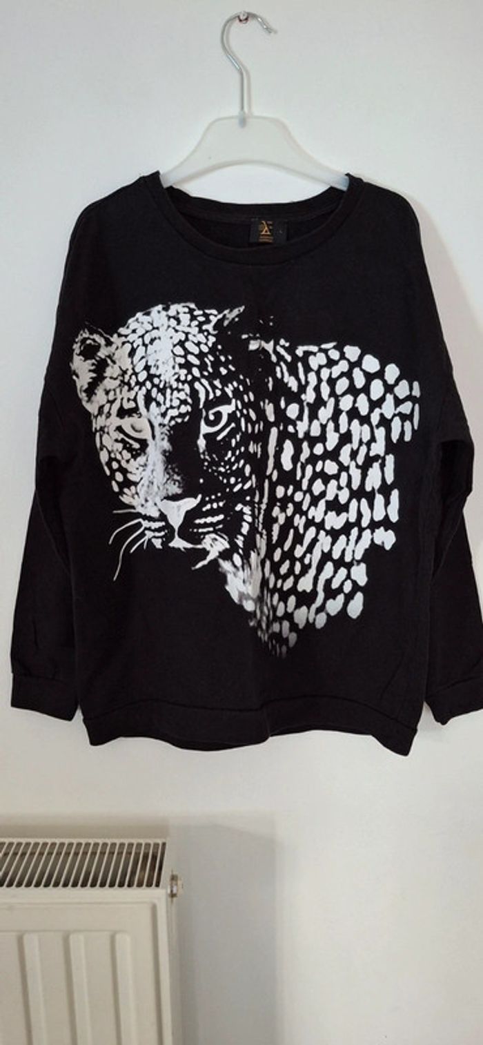 Sweat léopard noir et blanc