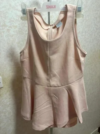 Haut péplum rose poudré Karl Marc John (Taille S)