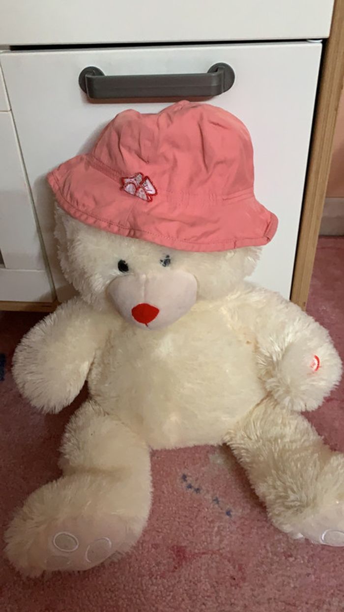 Chapeau couleur pêche / abricot taille 9 / 12 mois