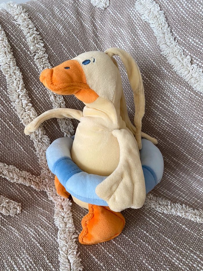 Peluche doudou musical 33cm Sucre d'Orge canard jaune orange et bleu très bon état - photo numéro 3