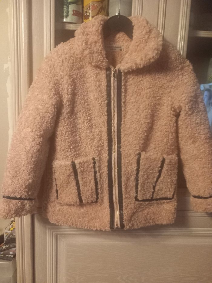 Manteau rose et noir taille 10 ans