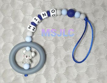 Attache tétine dentition