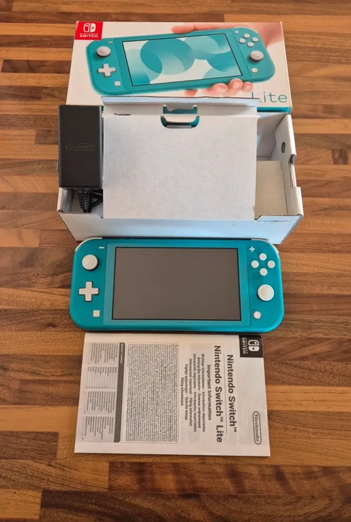 Console Nintendo switch lite "Bleu turquoise " en boîte - photo numéro 2