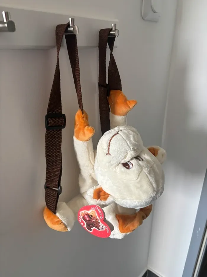 Sac à dos singe blanc cassé neuf