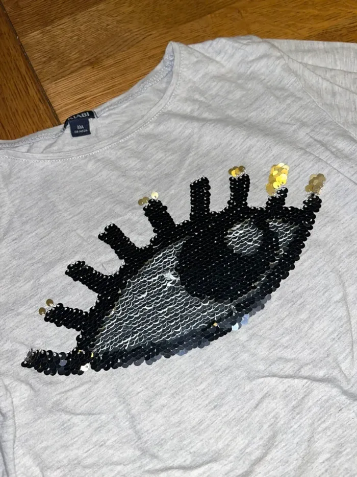 Teeshirt œil Kiabi 10 ans - photo numéro 2