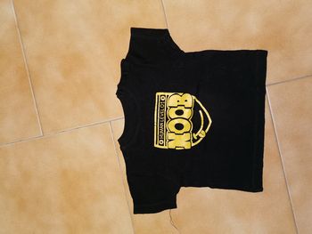 Tee shirt noir et jaune 9mois