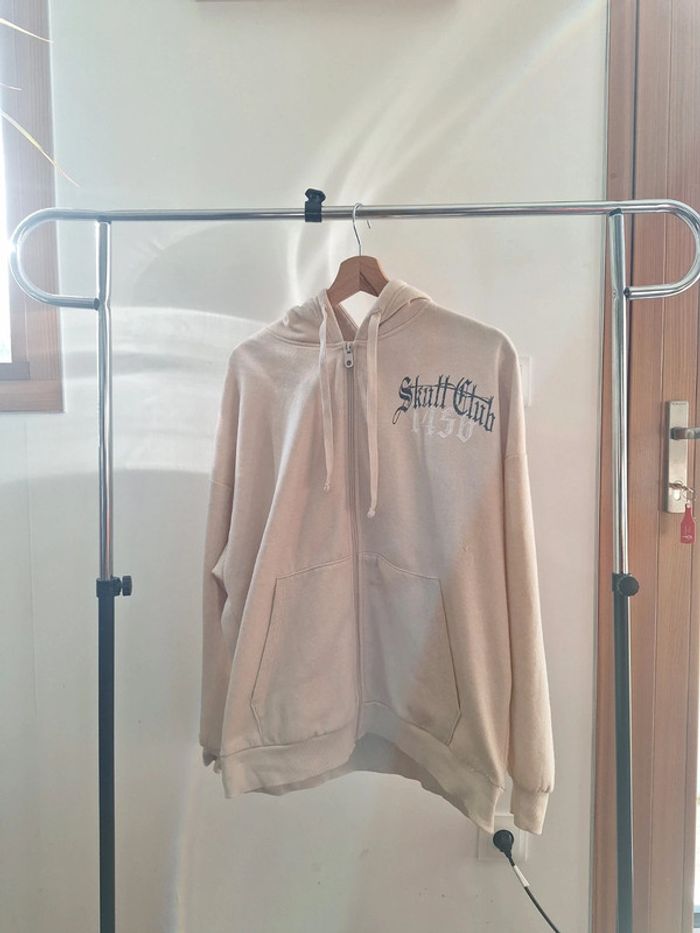 Veste oversize beige "Skull Club 1450" Femme S Jennyfer