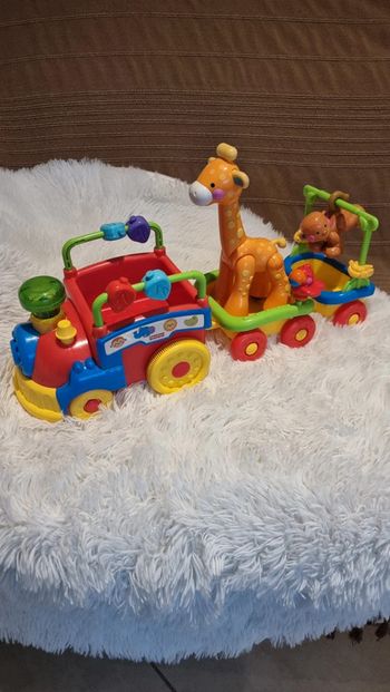 Petit train musical fisher price avec sa girafe et son singe