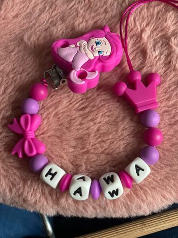 Attache tétine ariel