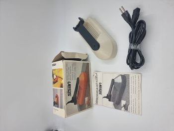 Défroisseur – repasseur à vapeur Sisan orange et noire