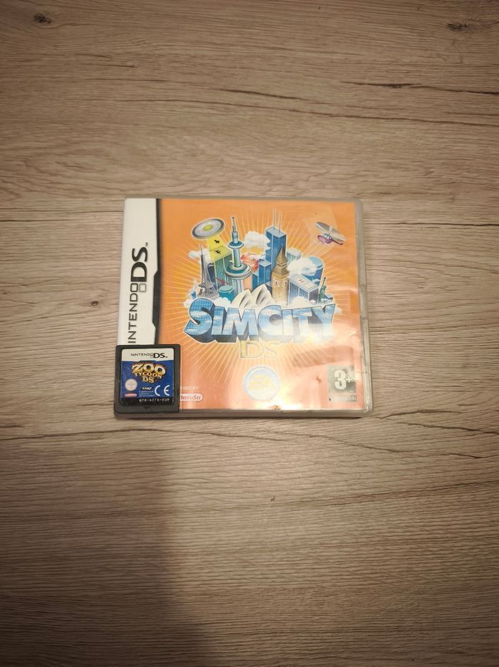 Lot jeux DS zoo Tycoon et simcity