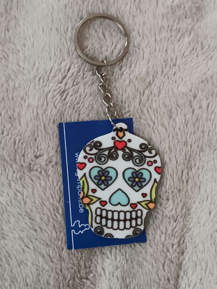 Porte clef tete de mort mexicaine yeux turquoise