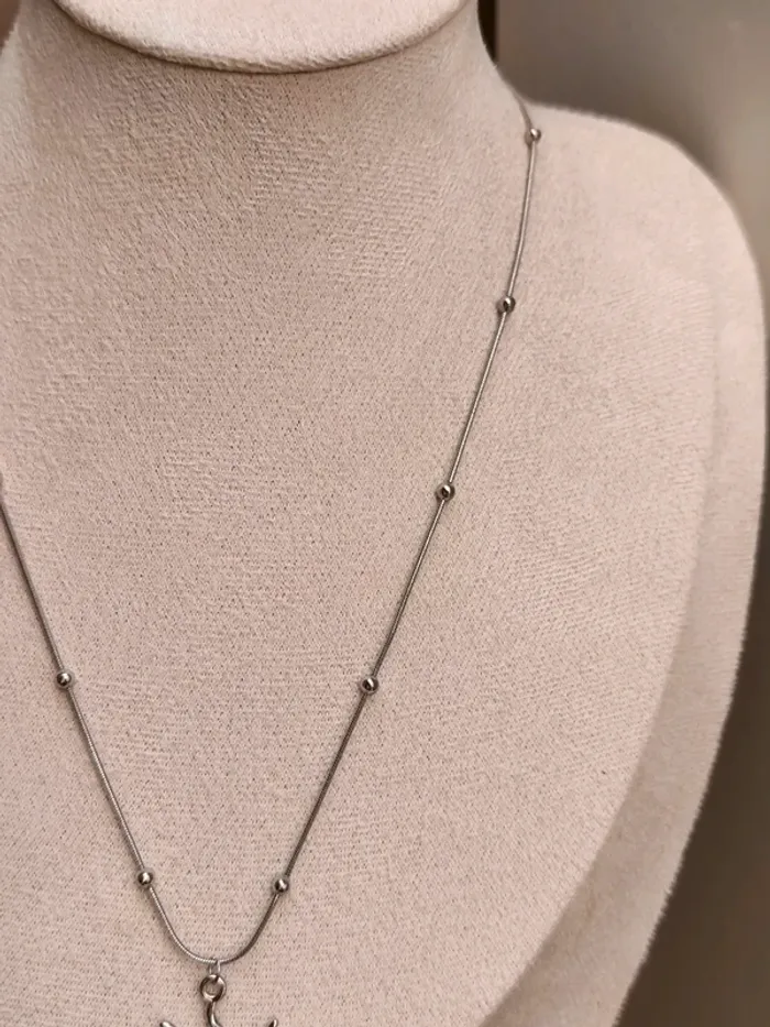 Collier argenté avec billes et soleil - photo numéro 5