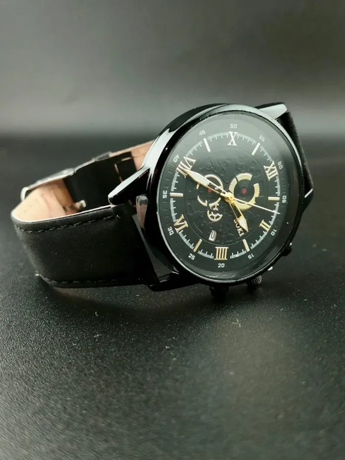 Montre noire/dark légère dorée hommes