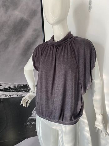 Haut loose blousant emmanchures chauve souris