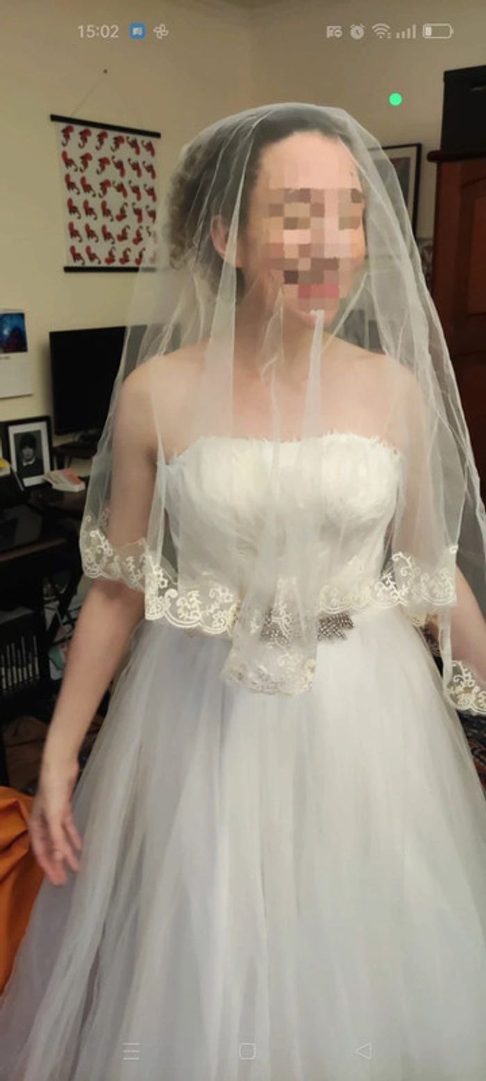 Robe de mariée bustier 36 "princesse" plumes et strass avec traîne et voile - photo numéro 11